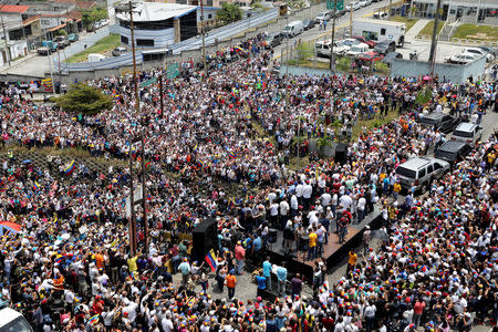 People gather as Venezuelan opposition leader Juan Guaido, who many nations have recognised as the country's rightful interim ruler, attends a rally in San Antonio, Venezuela, March 30, 2019. REUTERS/Manaure Quintero