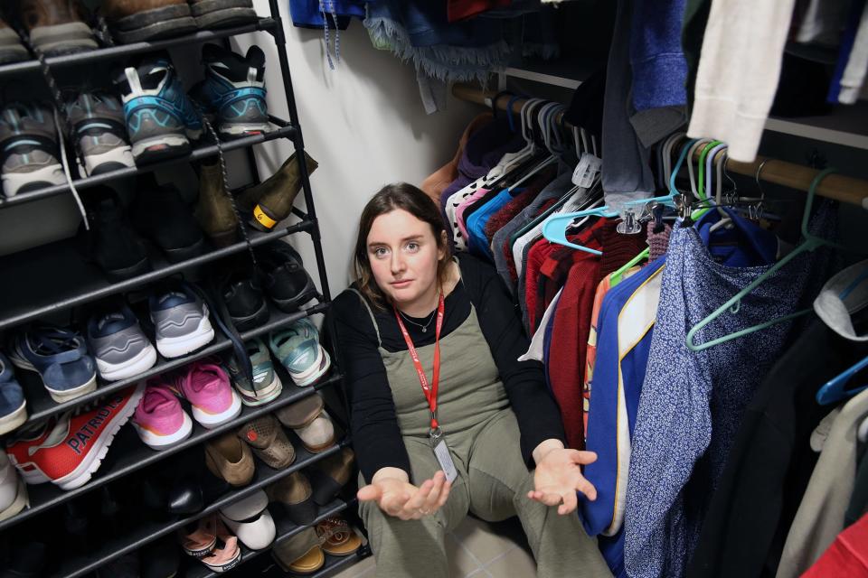 Jenni Palkovic, a transitional living care coordinator for Waypoint shows off Bri's Closet, a space where homeless teens can come to choose clothing they might need to help them through at the Rochester drop-in center.