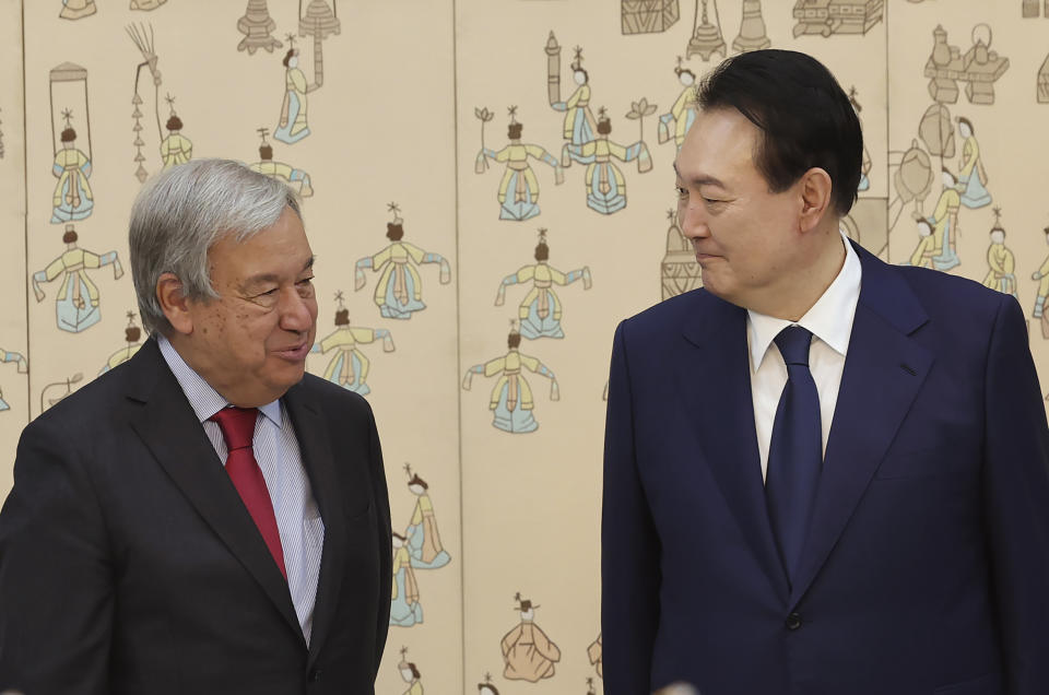 South Korean President Yoon Suk Yeol, right, talks with Secretary-General of the United Nations Antonio Guterres during a meeting at the presidential office in Seoul, South Korea, Friday, Aug. 12, 2022. (Suh Myung-geon/Yonhap via AP)