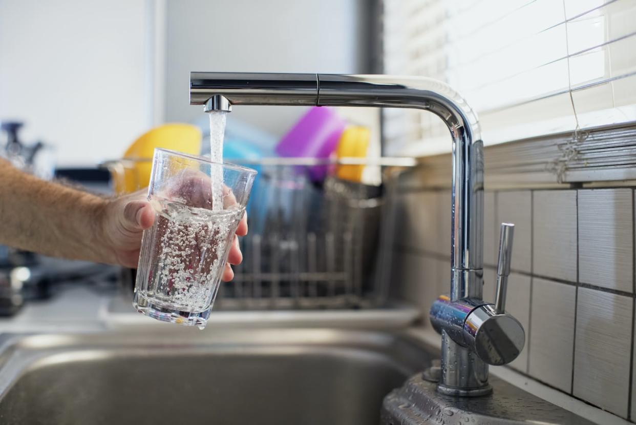 A new federal regulation will set national limits on two 'forever chemicals' widely found in drinking water. <a href="https://www.gettyimages.com/detail/photo/man-holding-a-glass-of-water-royalty-free-image/871648094" rel="nofollow noopener" target="_blank" data-ylk="slk:Thanasis Zovoilis/moment via Getty Images;elm:context_link;itc:0;sec:content-canvas" class="link ">Thanasis Zovoilis/moment via Getty Images</a>