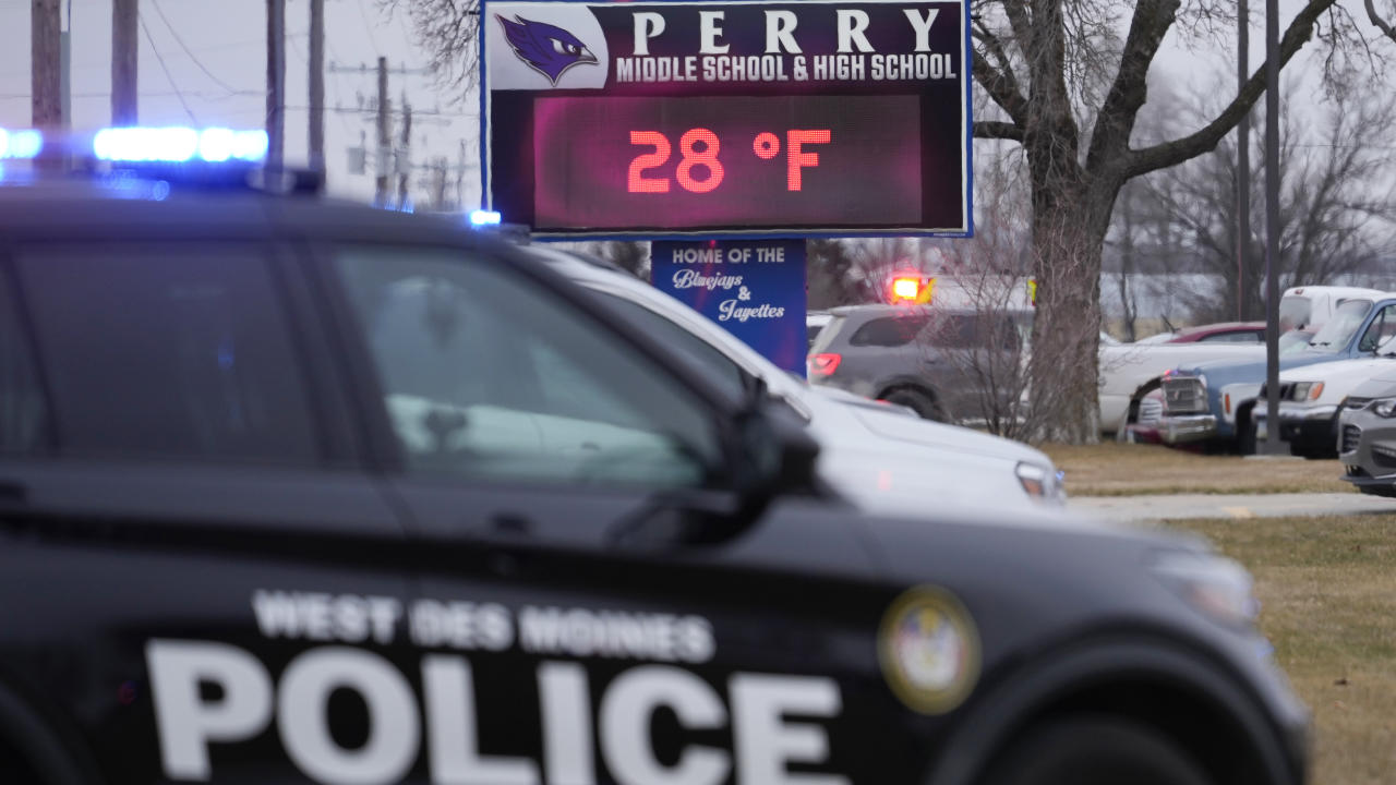 A West Des Moines Police vehicle outside Perry High School in Perry, Iowa.