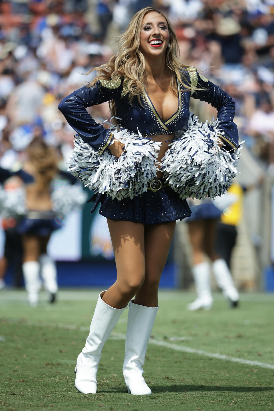<p>The Los Angeles Rams Cheerleaders perform during the game against the Indianapolis Colts at Los Angeles Memorial Coliseum on September 10, 2017 in Los Angeles, California. (Photo by Jeff Gross/Getty Images) </p>