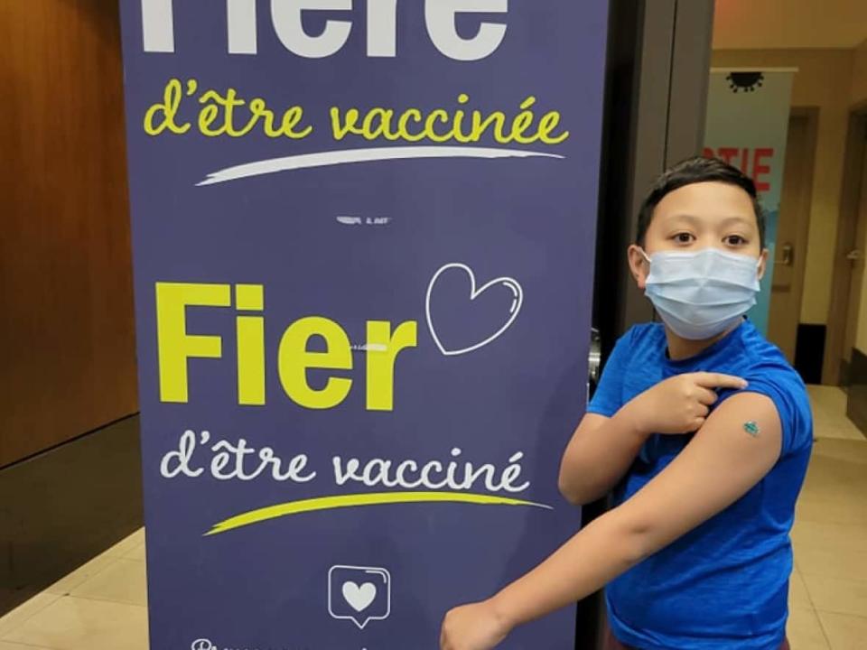 Phoenix Kanti submitted this image of her child after he received his first dose of the COVID-19 vaccine in the Outaouais. (Submitted by Phoenix Kanti - image credit)