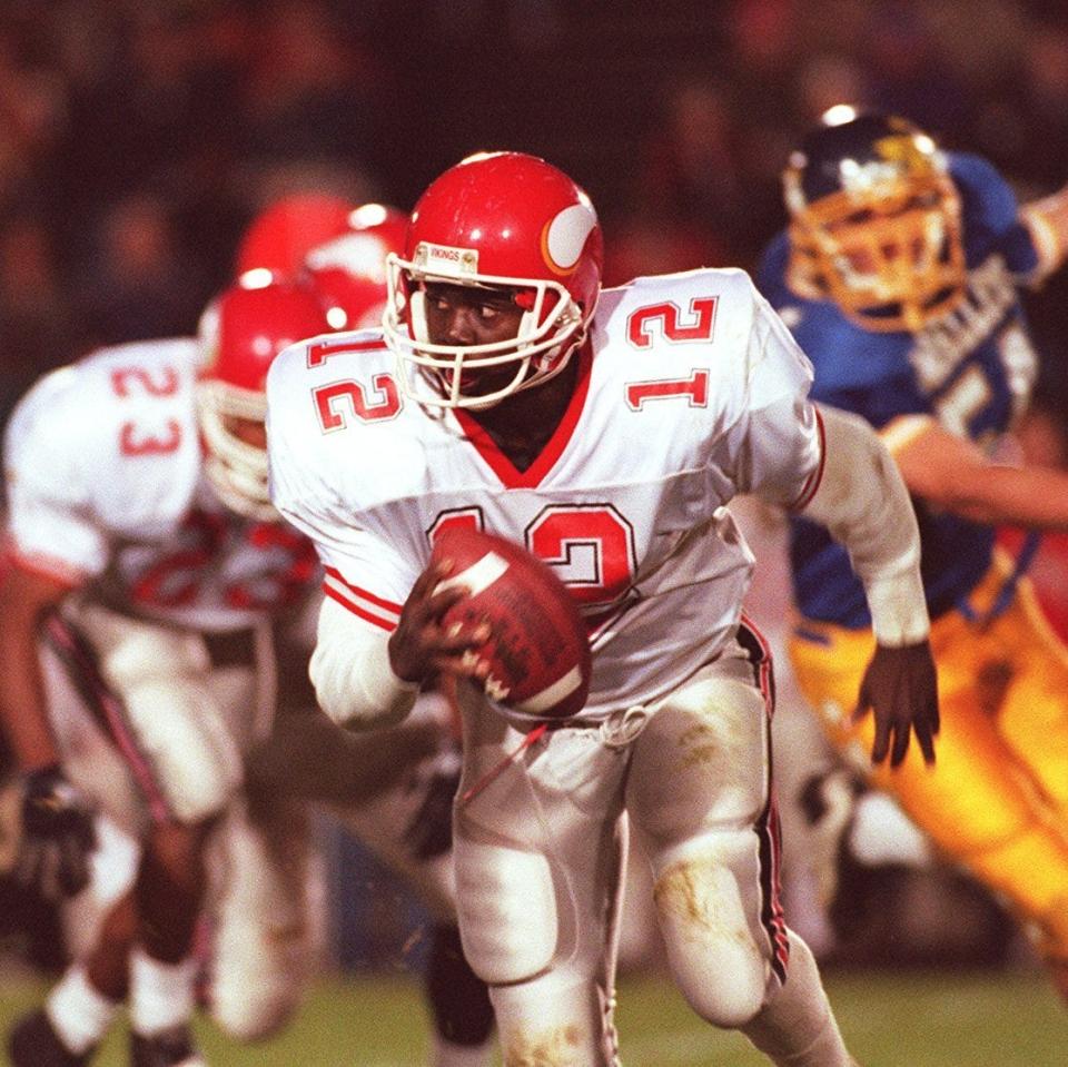 NOVEMBER 1, 1996: Princeton quarterback Vincent Harrison takes off with the ball in the first half against Moeller.