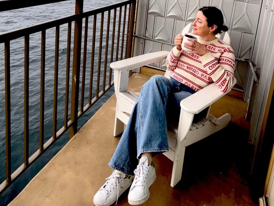 simone sitting out on a deck at the Edgewater hotel in Seattle Washington