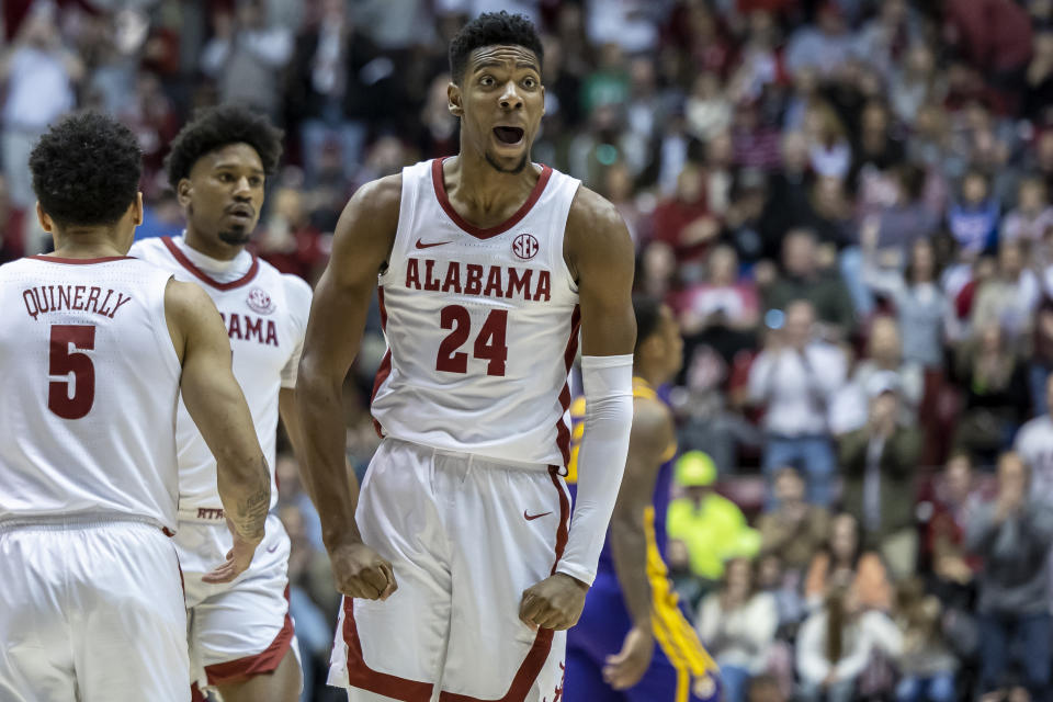 Alabama forward Brandon Miller (24) reacts after a 3-point basket during the first half of an NCAA college basketball game against LSU, Saturday, Jan. 14, 2023, in Tuscaloosa, Ala. (AP Photo/Vasha Hunt)