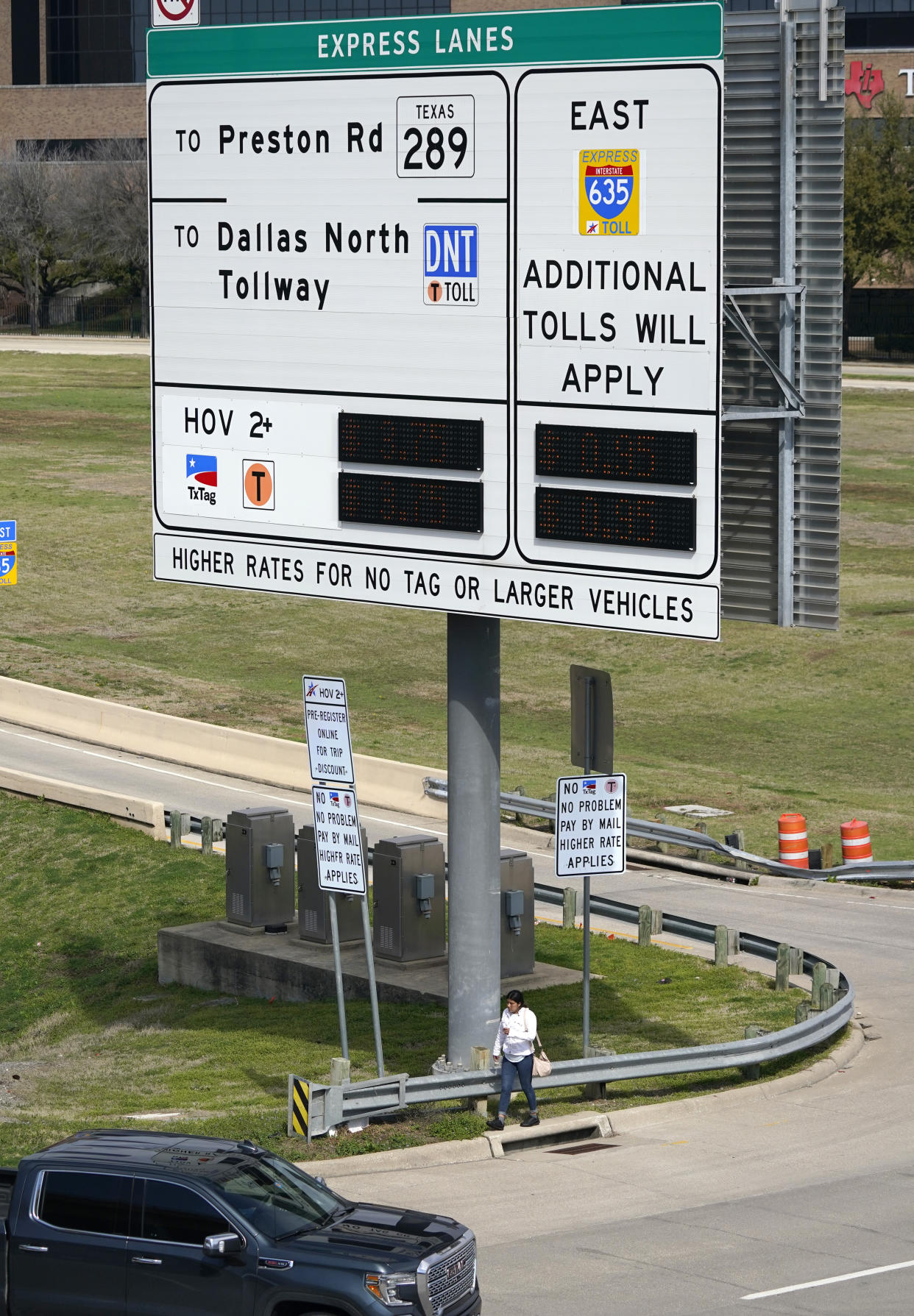 An express lanes highway sign marks an entrance in Dallas, Friday, March 3, 2023. There is growing interest in the South in fee-based express lanes in which some drivers can up to avoid congestion on highways where other drivers can access general lanes for free. (AP Photo/LM Otero)