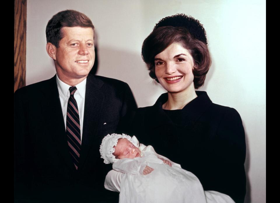 U.S. Senator John Fitzgerald Kennedy (JFK) and his wife Jacqueline pose with their son John Jr. on December 10, 1960. (AFP/Getty Images)  