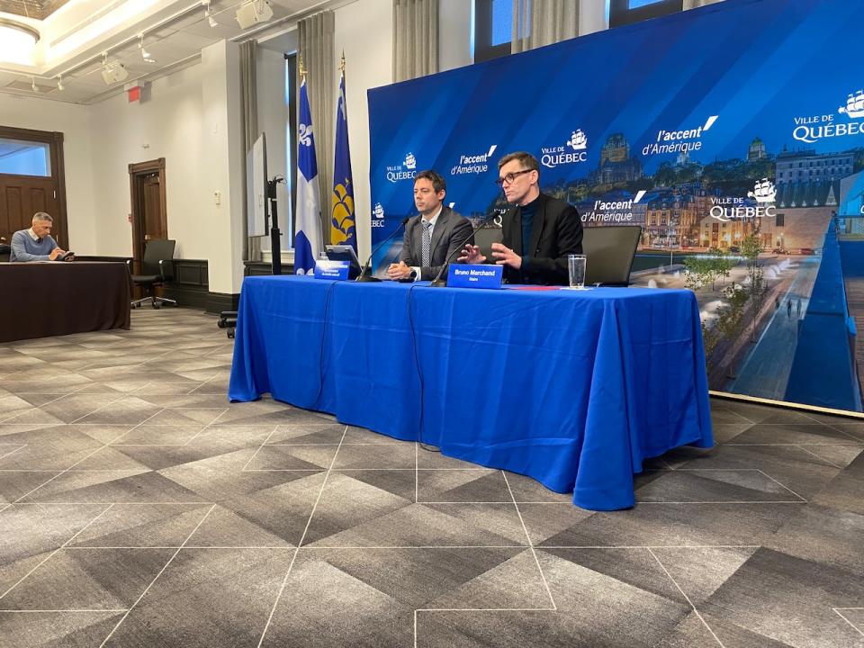 Pierre-Luc Lachance and Bruno Marchand presented the city's plan for the 150-kilometre cycling network at a news conference on Tuesday at city hall. 