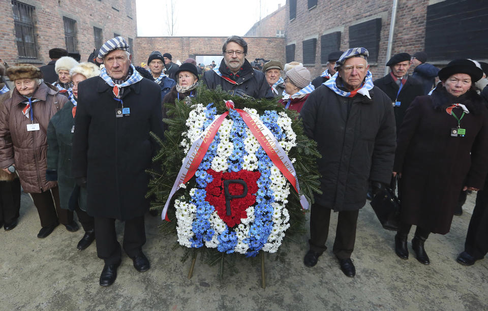 <p>Holocaust survivors commemorate the people killed by the Nazis at the former Auschwitz Germany Nazi death camp in Oswiecim, Poland, Friday, Jan. 27, 2017, on the International Holocaust Remembrance Day that marks the liberation of the Auschwitz Nazi death camp on Jan. 27, 1945. (Photo: Czarek Sokolowski/AP) </p>