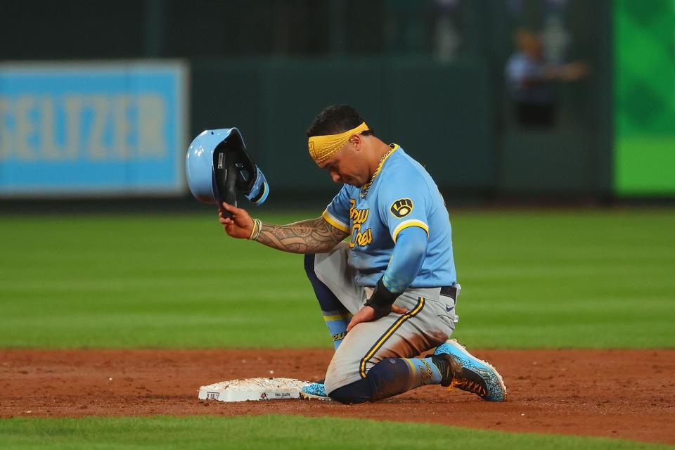 Kolten Wong of the Brewers reacts after being thrown out trying to steal second base against the Cardinals to end the third inning Wednesday night.