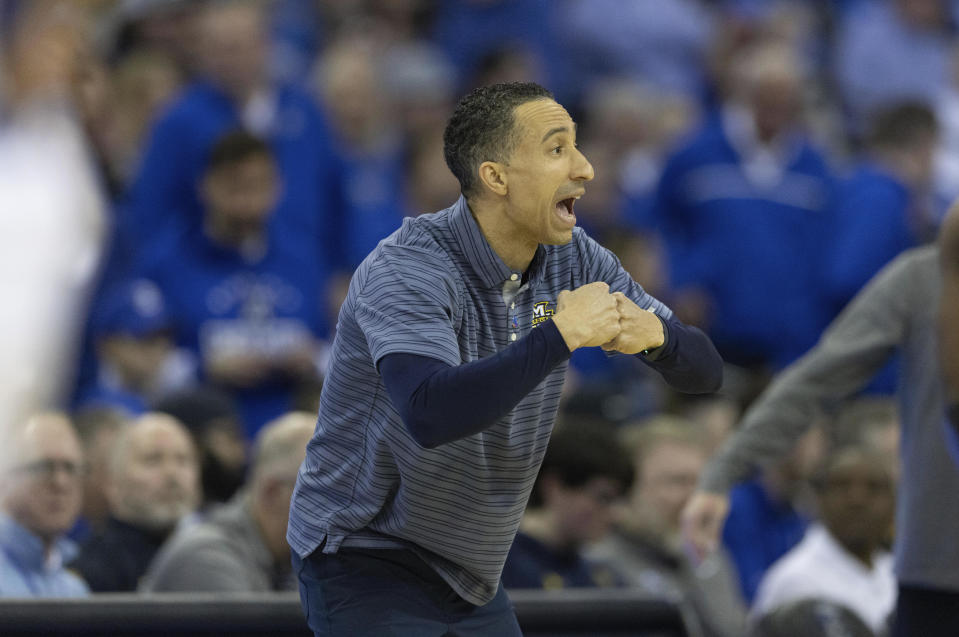 Marquette head coach Shaka Smart signals his team as they play against Creighton during the first half of an NCAA college basketball game on Tuesday, Feb. 21, 2023, in Omaha, Neb. (AP Photo/Rebecca S. Gratz)