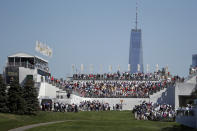 <p>The crowd watches the opening ceremony on the first tee before the first round of the Presidents Cup at Liberty National Golf Club in Jersey City, N.J., Sept. 28, 2017. (Photo: Julio Cortez/AP) </p>