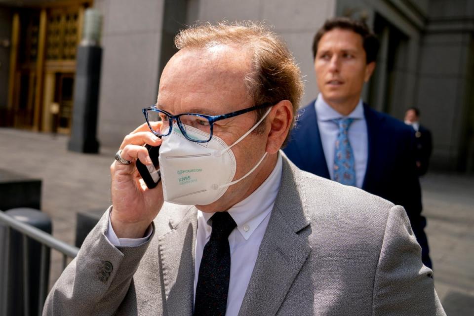 Kevin Spacey leaves court after testifying in a civil lawsuit on May 26, 2022, in New York. British prosecutors have charged Spacey with four counts of sexual assault against three men. The 62-year-old double Academy Award winner was questioned by British police in 2019 about claims by several men that he had assaulted them. The U.K. charges were announced Thursday, as Spacey was testifying in a courtroom in New York City in a civil lawsuit. (AP Photo/John Minchillo) (AP)