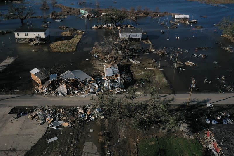 Destroyed homes are surrounded by flood waters in aftermath of Hurricane Delta in Cameron, Louisiana