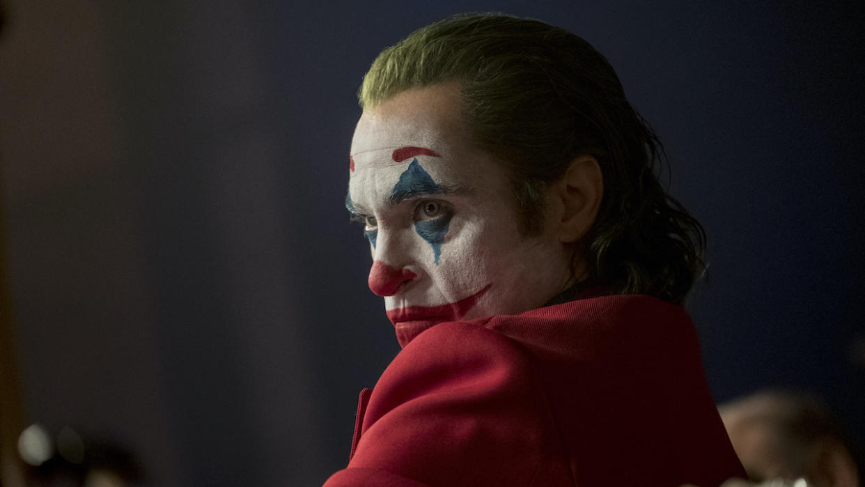  Joaquin Phoenix made up as Joker. 