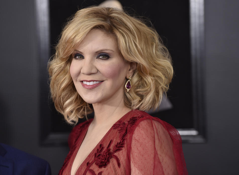 FILE - In this Jan. 28, 2018, file photo, Alison Krauss arrives at the 60th annual Grammy Awards at Madison Square Garden, in New York. Oscar-winning actor Jon Voight, singer and musician Krauss and mystery writer James Patterson are among those being honored by President Donald Trump for their contributions to the arts or the humanities. The White House announced four recipients of the National Medal of Arts and four of the National Humanities Medal Sunday night, Nov. 17, 2019. (Photo by Evan Agostini/Invision/AP, File)