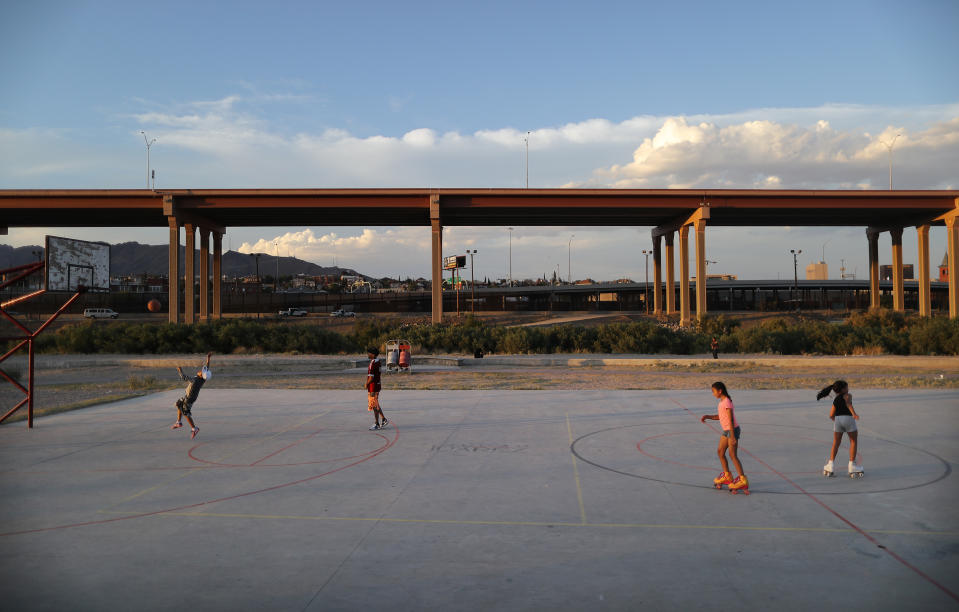 CIUDAD JUAREZ, MEXICO - JUNE 27: Kids play on the Mexican side of the U.S.-Mexico border, with the U.S. visible in the background on June 27, 2019, in Ciudad Juarez, Mexico. The Mexican government has deployed 15,000 soldiers to its border with the United States as part of a broader immigration crackdown. According to U.S. Customs and Border Protection (CBP) statistics, apprehensions along the southwest border in May of family units increased 463%, while apprehensions of unaccompanied children climbed 74%, compared to May 2018.  (Photo by Mario Tama/Getty Images)