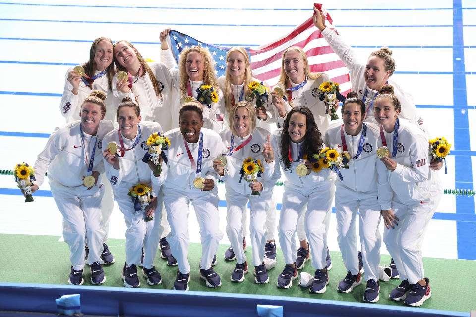 TOKYO, JAPAN - AUGUST 07: Gold medalists Team United States pose after receiving their medals during the Women's Gold Medal match between Spain and the United States on day fifteen of the Tokyo 2020 Olympic Games at Tatsumi Water Polo Centre on August 07, 2021 in Tokyo, Japan. (Photo by Atsushi Tomura/Getty Images)