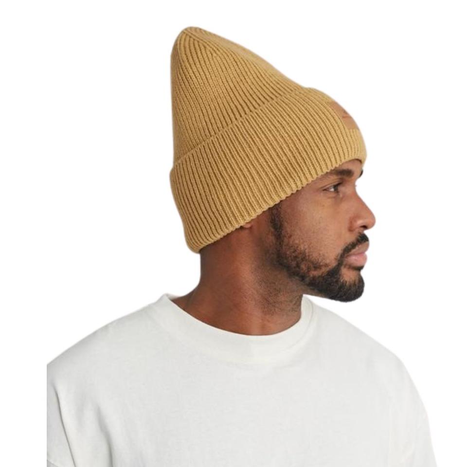 As someone who's been wearing Grace Eleyae beanies for a few years, I can confidently say they are the best giftable winter accessories. Grace Eleyae created the brand in 2014 after experiencing significant hair breakage during a trip to Kenya. These modern and functional satin-lined unisex beanies come in a variety of styles and colors, including this tan high-top model.Beanie: $42 at Grace EleyaeShop Grace Eleyae
