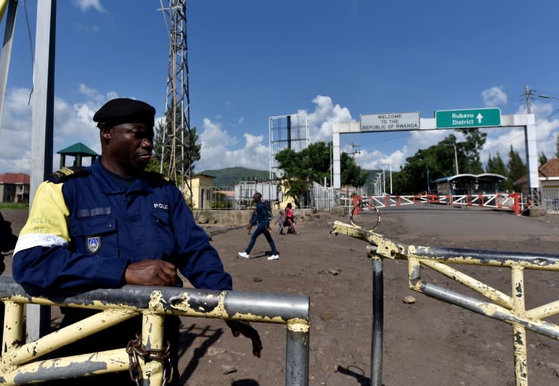 A police officer stands at the deserted crossing point between the Democratic Republic of Congo and Rwanda amid concerns about the spread of coronavirus disease (COVID-19), at the Petite Barriere in Goma