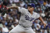 Los Angeles Dodgers starting pitcher Julio Urias throws during the first inning of a baseball game against the Milwaukee Brewers Monday, Aug. 15, 2022, in Milwaukee. (AP Photo/Morry Gash)