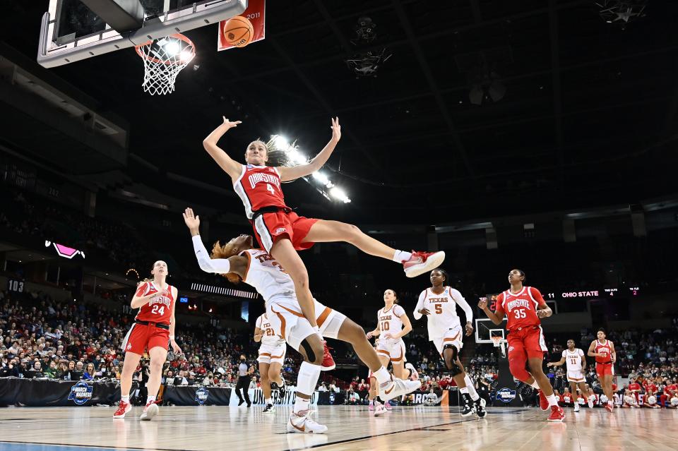 Ohio State guard Jacy Sheldon tries to get off a shot against Texas' Rori Harmon. Sheldon was the Buckeyes' leading scorer this season. Texas advanced to play Stanford in Sunday's Elite Eight.