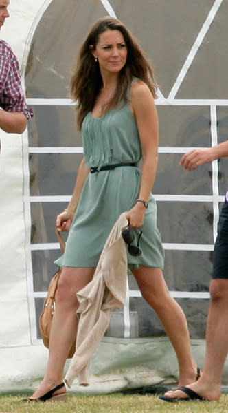 <div class="caption-credit"> Photo by: Getty</div>She donned a pretty sage dress and oversize shades to watch William play polo in 2010 at the Beaufort Polo Club in Gloucestershire. <br>