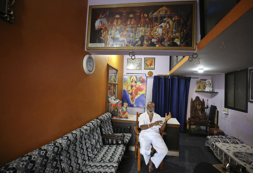 Hindu nationalist group Sri Ram Sena Hindustan leader, Ramakant Konduskar speaks to the Associated Press at his home in Belagavi, India, Oct. 7, 2021. Konduskar, who calls himself a foot soldier in the battle to save Hinduism, said he is not against any religion but people should marry within their own. He considers "love jihad" a threat to society. "Our Hindu culture is thousands of years old," he said, "and we should preserve it and value it." (AP Photo/Aijaz Rahi)