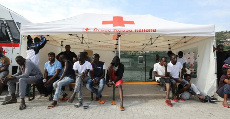 Migrants waits at a Red Cross center in the city of Ventimiglia on the French-Italian border, on September 14, 2016