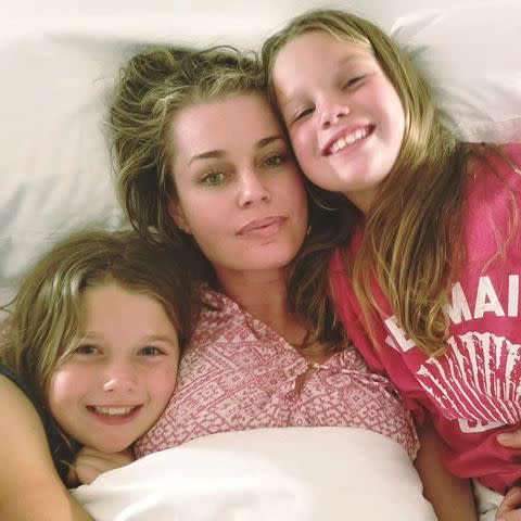 <p>Jerry O'Connell/Instagram</p> Rebecca Romijn cozies up with her daughters Charlie and Dolly