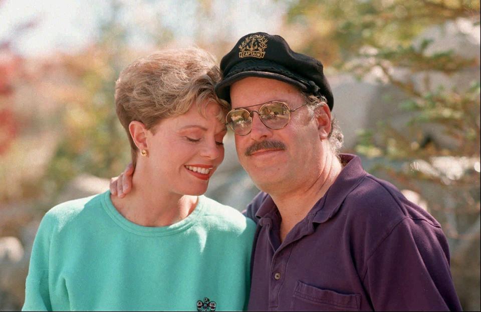 FILE-This Oct. 25, 1995 file photo shows Toni Tennille, left, and Daryl Dragon, the singing duo The Captain and Tennille, posing during an interview in at their home in Washoe Valley, south of Reno, Nev. Dragon died early Wednesday, Jan. 2, 2019 in at a hospice in Prescott, Ariz. Spokesman Harlan Boll said he was 76 and died of renal failure. His former wife and musical partner, Toni Tennille, was by his side. (AP Photo/David B. Parker, File)