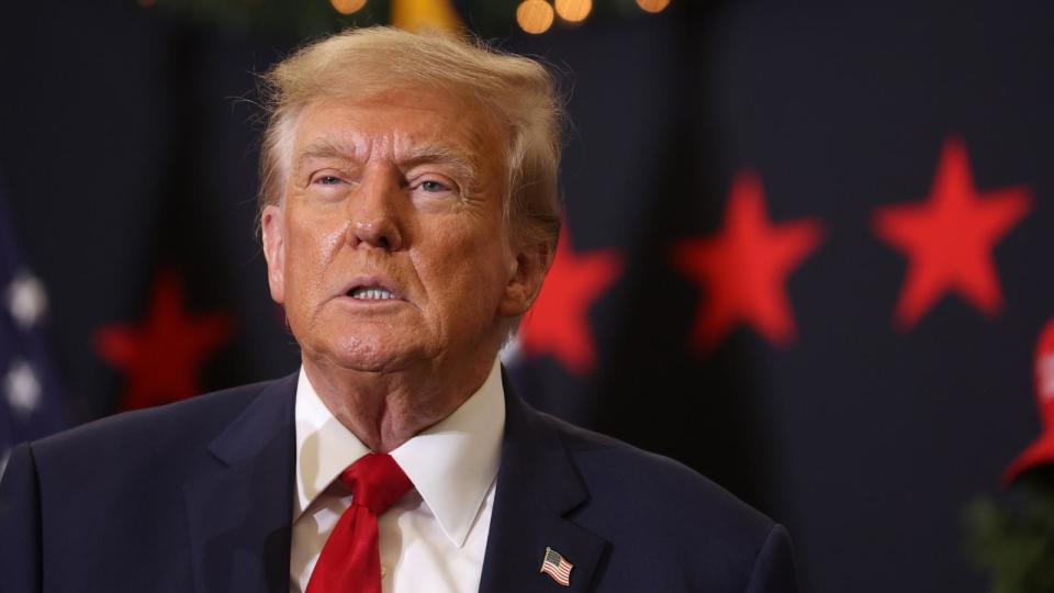 PHOTO: Republican presidential candidate and former President Donald Trump looks on during a campaign event on Dec. 19, 2023 in Waterloo, Iowa.  (Scott Olson/Getty Images)