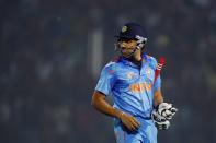 India’s Rohit Sharma looks back as he walks back to the pavilion after his dismissal by Bangladesh’s Ziaur Rahman during the Asia Cup one-day international cricket tournament between them in Fatullah, near Dhaka, Bangladesh, Wednesday, Feb. 26, 2014. (AP Photo/A.M. Ahad)