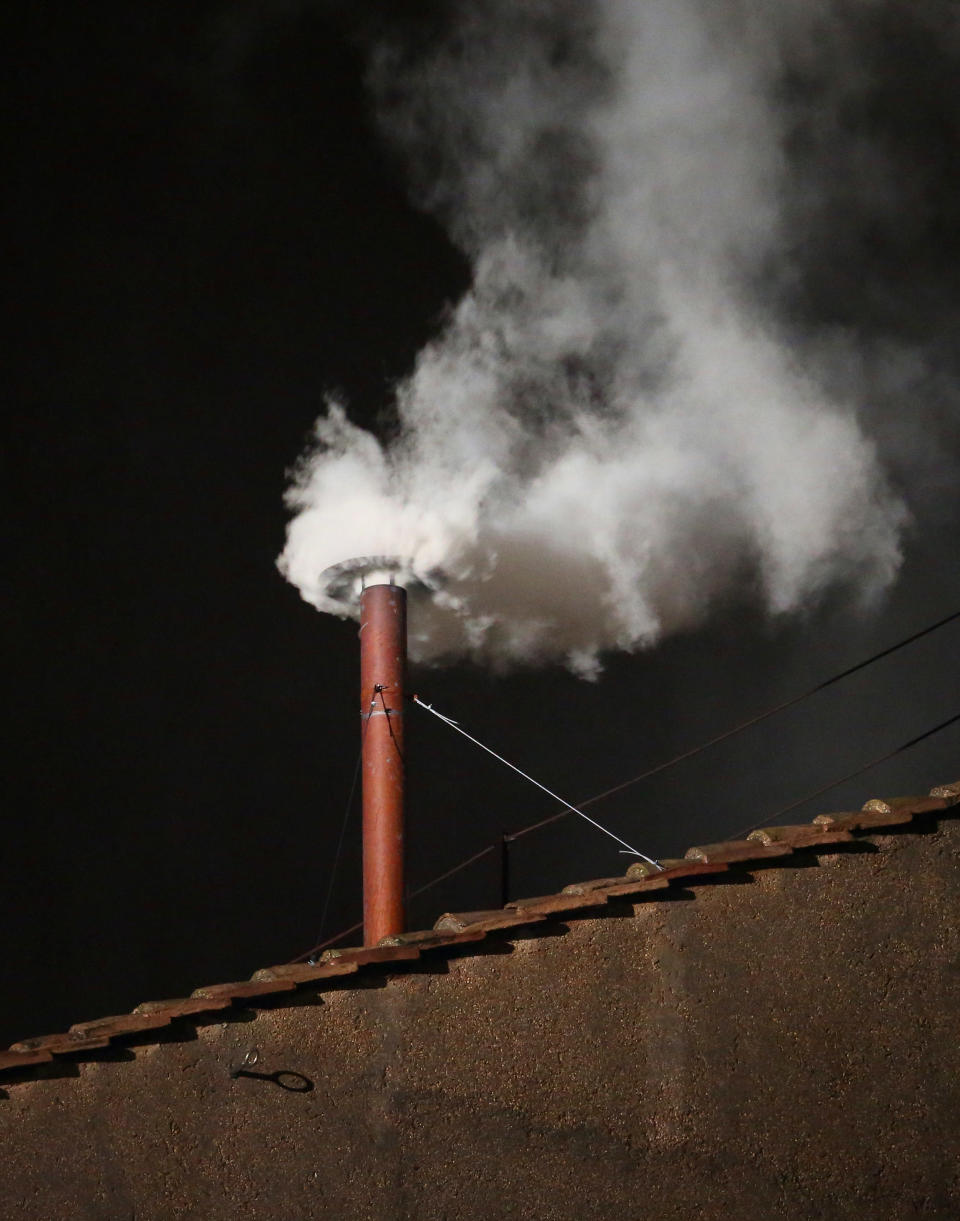 VATICAN CITY, VATICAN - MARCH 13: White smoke billows from the chimney on the roof of the Sistine Chapel indicating that the College of Cardinals have elected a new Pope on March 13, 2013 in Vatican City, Vatican. (Photo by Peter Macdiarmid/Getty Images)