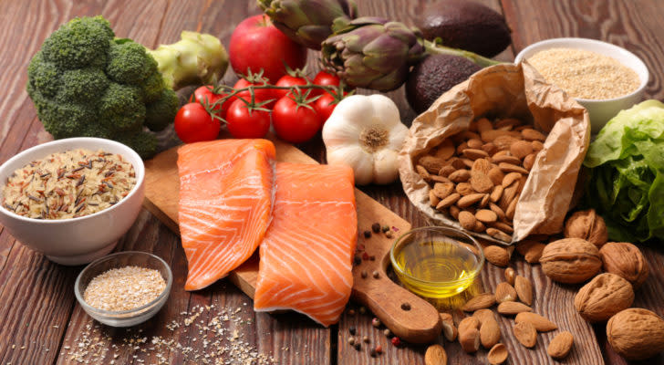 healthy food uncluding salmon, broccoli, tomatoes, nuts and more