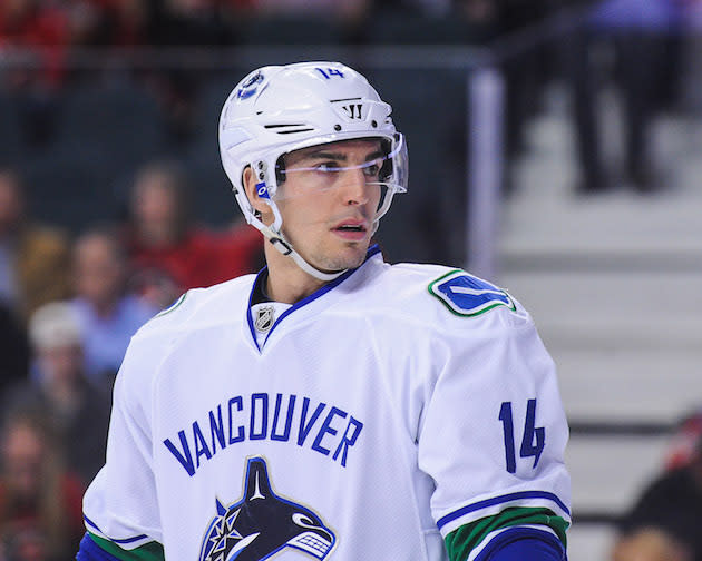 CALGARY, AB – APRIL 7: Alex Burrows #14 of the Vancouver Canucks in action against the Calgary Flames during an NHL game at Scotiabank Saddledome on April 7, 2016 in Calgary, Alberta, Canada. (Photo by Derek Leung/Getty Images)