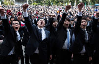 <p>Vocational school students raise their fists during a rally to kick off job-hunting on March 1, 2017 in Tokyo, Japan. About 1,500 students from 11 schools participated in the event ahead of their job-hunting as Japan’s unemployment rate fell to 3.1%, the lowest in 22 years in December, released on January 31. (Tomohiro Ohsumi/Getty Images) </p>