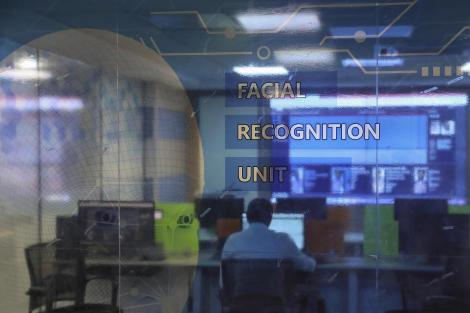 Employees work at the Facial Recognition Unit at the Hyderabad Police Headquarters in Hyderabad, India, Thursday, April 21, 2022. (AP Photo/Mahesh Kumar A.)