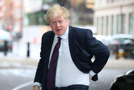 Britain's Foreign Secretary, Boris Johnson, arrives at the BBC to appear on the Andrew Marr Show, in central London, Britain March 18, 2018. REUTERS/Hannah McKay
