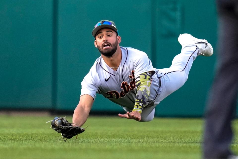 Detroit Tigers center fielder Riley Greene dives to catch the ball hit by the Washington Nationals'  Lane Thomas during the first inning at Nationals Park in Washington from May 19-21, 2023.