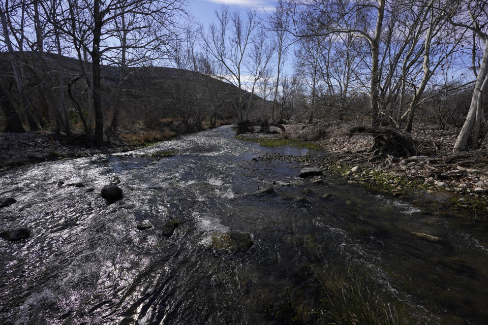 The Devil's River is seen on a ranch near Del Rio, Texas, Thursday, Feb. 16, 2023. When a China-based developer decided to erect dozens of wind turbines in the area, each the size of the tallest skyscraper in San Antonio, across thousands of scrubby acres fed by one of America's cleanest waterways, local landowners made it their mission to stop the project. (AP Photo/Eric Gay)