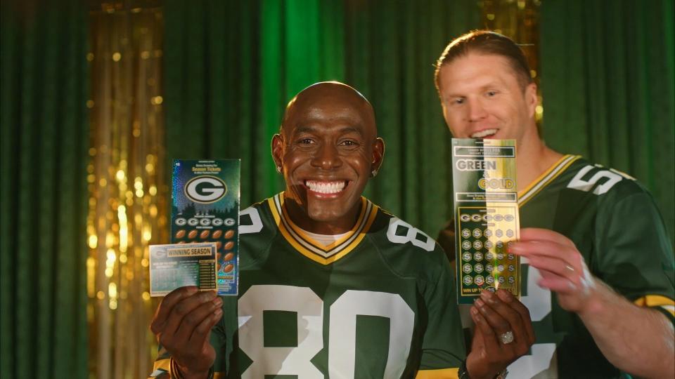 Former Green Bay Packers players Donald Driver, left, and Clay Matthews star in a new TV spot for the Wisconsin Lottery's Packers scratch tickets.