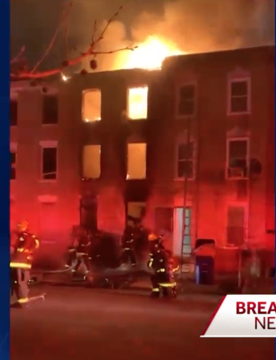 Firefighters battle the blaze in West Baltimore where three died when a building collapsed (WBAL-TV)