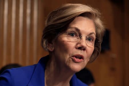 Senator Elizabeth Warren (D-MA) questions Alex Azar (not pictured) during a Senate Health, Education, Labor and Pensions Committee hearing on his nomination to be Health and Human Services secretary on Capitol Hill in Washington, U.S., November 29, 2017. REUTERS/Yuri Gripas