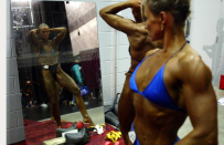 <div class="caption-credit"> Photo by: Michael Bradley/Getty Images</div>After thousands of hours at the gym and meticulously crafted nutrition plans, the final step for female bodybuilders poised for competition is product. Lots of it. Popular standards of beauty vary by era, geography, and culture, but in the world of women's muscle mass, there's one hard and fast rule.