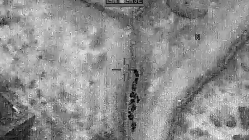 This image from video released by the Department of Defense on Wednesday, Oct. 30, 2019, and displayed at a Pentagon briefing, shows fighters who demonstrated hostile intent to U.S. forces during the infiltration of the assault force in the raid on the compound of Islamic State leader Abu Bakr al-Baghdadi Saturday, Oct. 26, 2019. (Department of Defense via AP)
