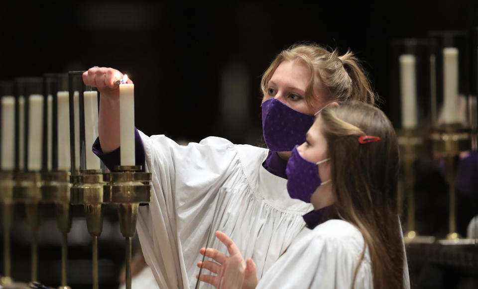 Members of the Canterbury Cathedral GirlsÕ Choir prepare to film the last of three pre-recorded online carol services which will be available to viewers on the cathedral website over the Christmas period. (Photo by Gareth Fuller/PA Images via Getty Images)