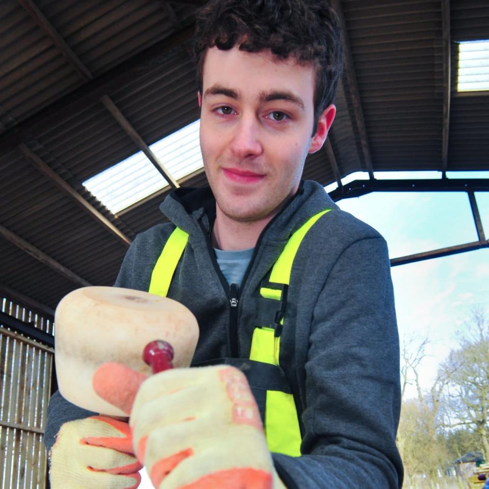 One of the students, Ollie Clegg, behind the restoration of The Lady's Well on Dumfries House estate