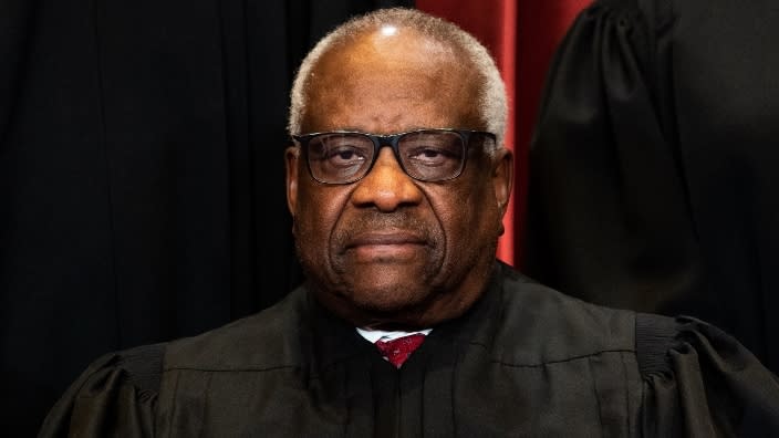 Associate Justice Clarence Thomas sits during a group photo of the Justices at the Supreme Court in Washington, D.C. last April. (Photo: Erin Schaff-Pool/Getty Images)